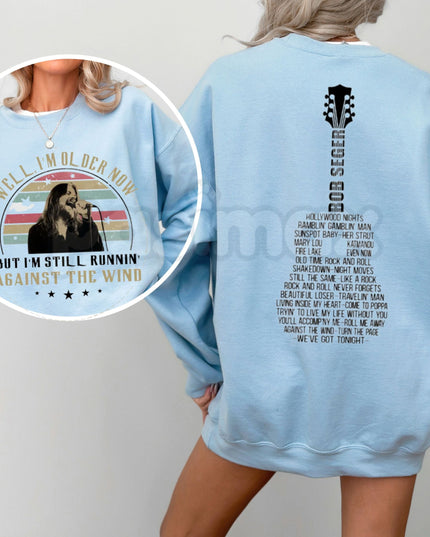 Bob Seger Vintage Quotes Sweatshirt | Two-Sided "Well I’m Older Now Still Running" Crewneck | Classic Rock Lyrics Jumper | Against The Wind Fan Pullover | Retro Heartland Rock Shirt | Music Legend Quote Graphic Top